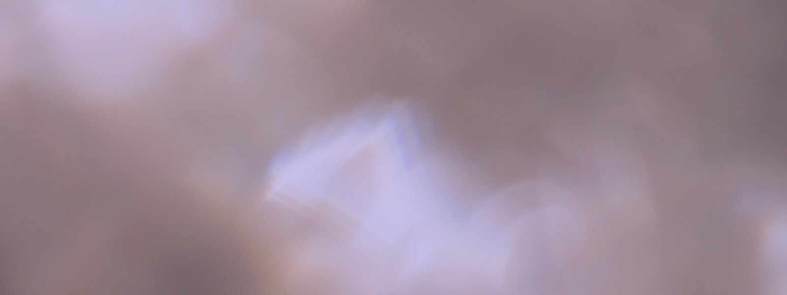 Abstract blurred background with soft colors and light.