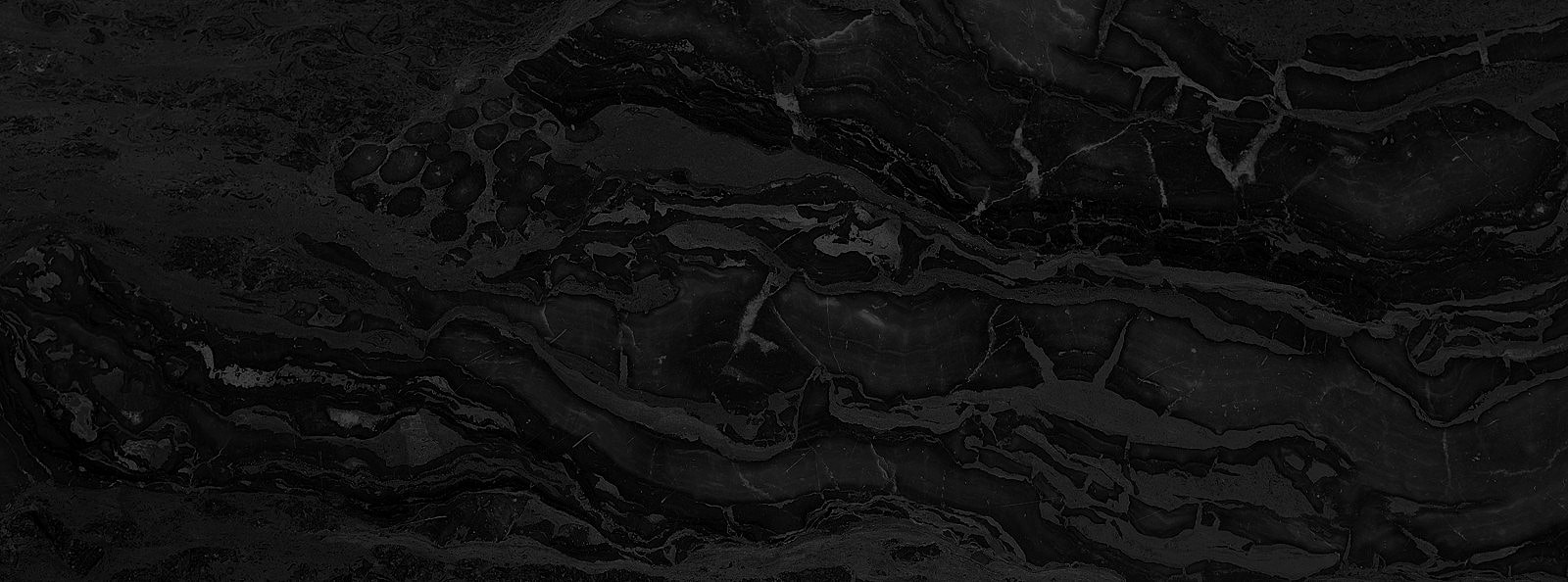 Black marble with elegant veining patterns.